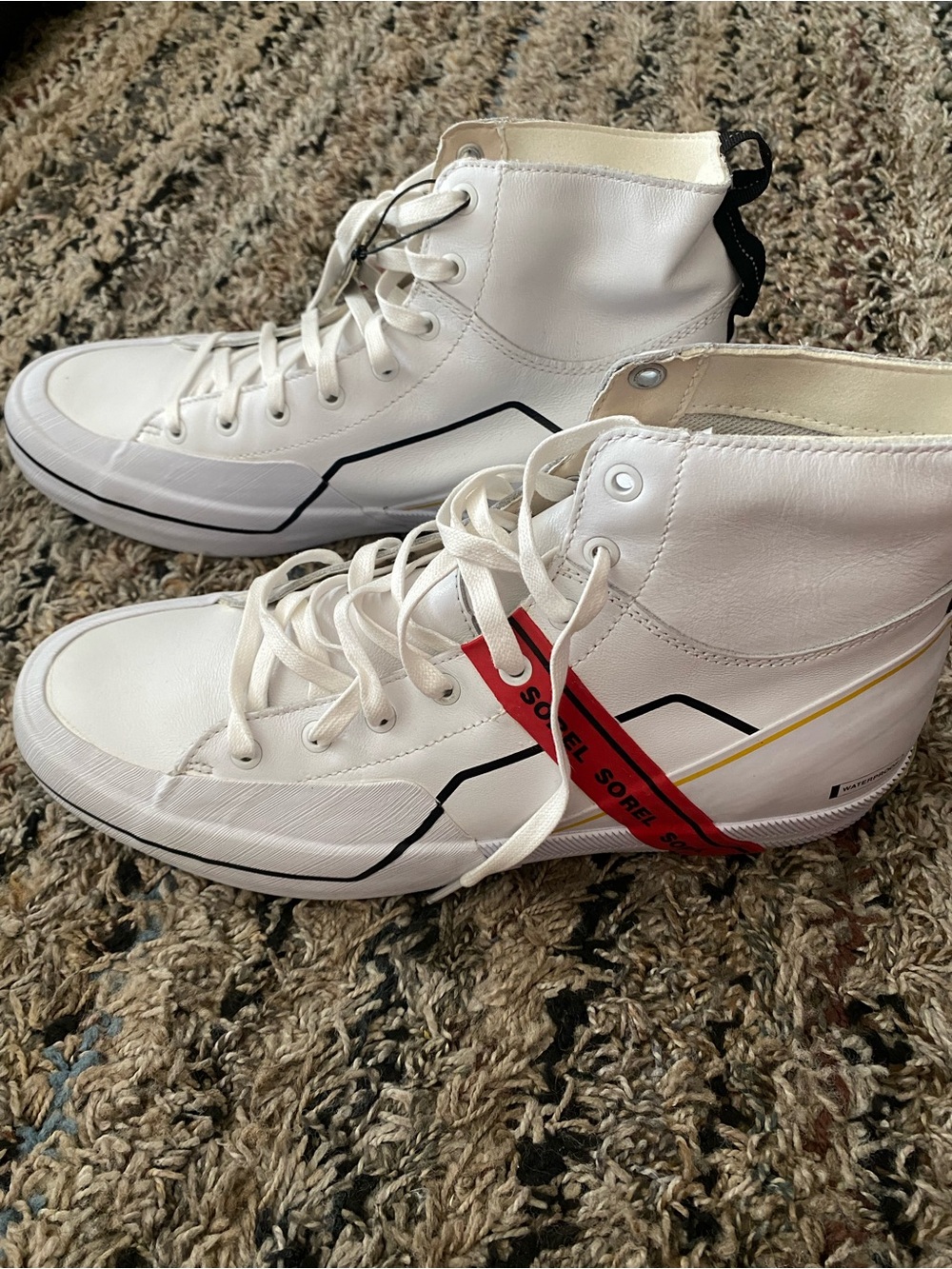 Sorel White High-Top Sneakers with Black and Red Accents
